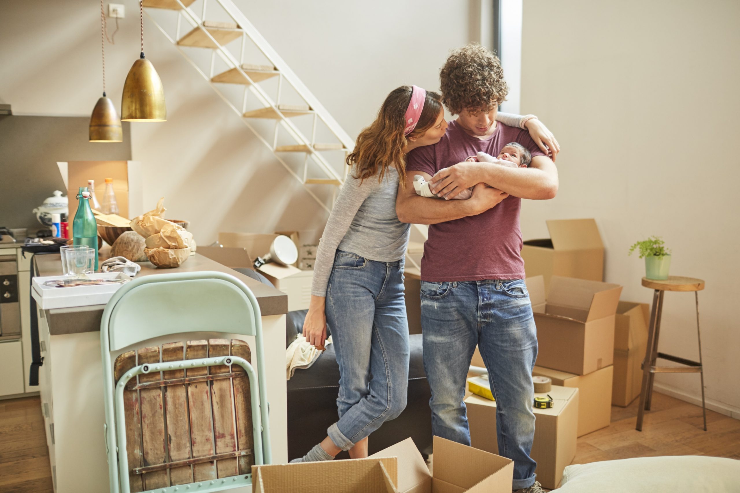 first time home buyers moving into their new home