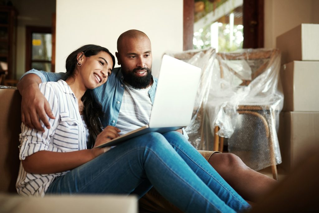 home buyers researching the difference between fixed-rate and adjustable-rate mortgages
