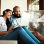 home buyers researching the difference between fixed-rate and adjustable-rate mortgages